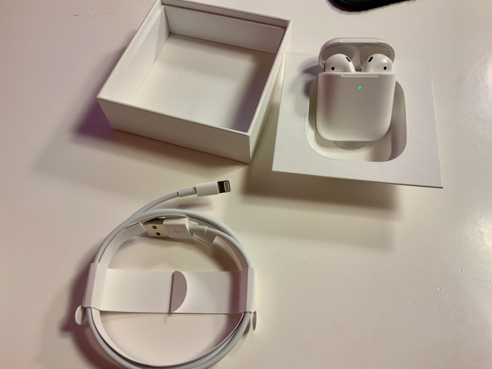 Apple AirPods auricolari wireless custodia ricarica Qi
