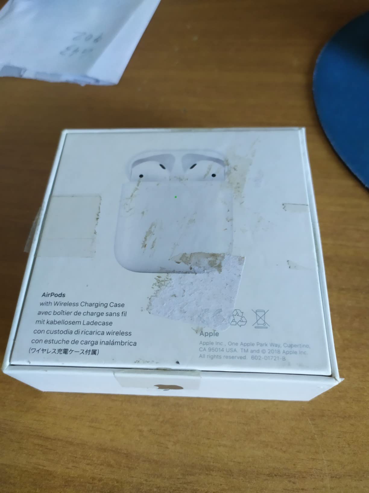 Apple AirPods auricolari wireless custodia ricarica Qi