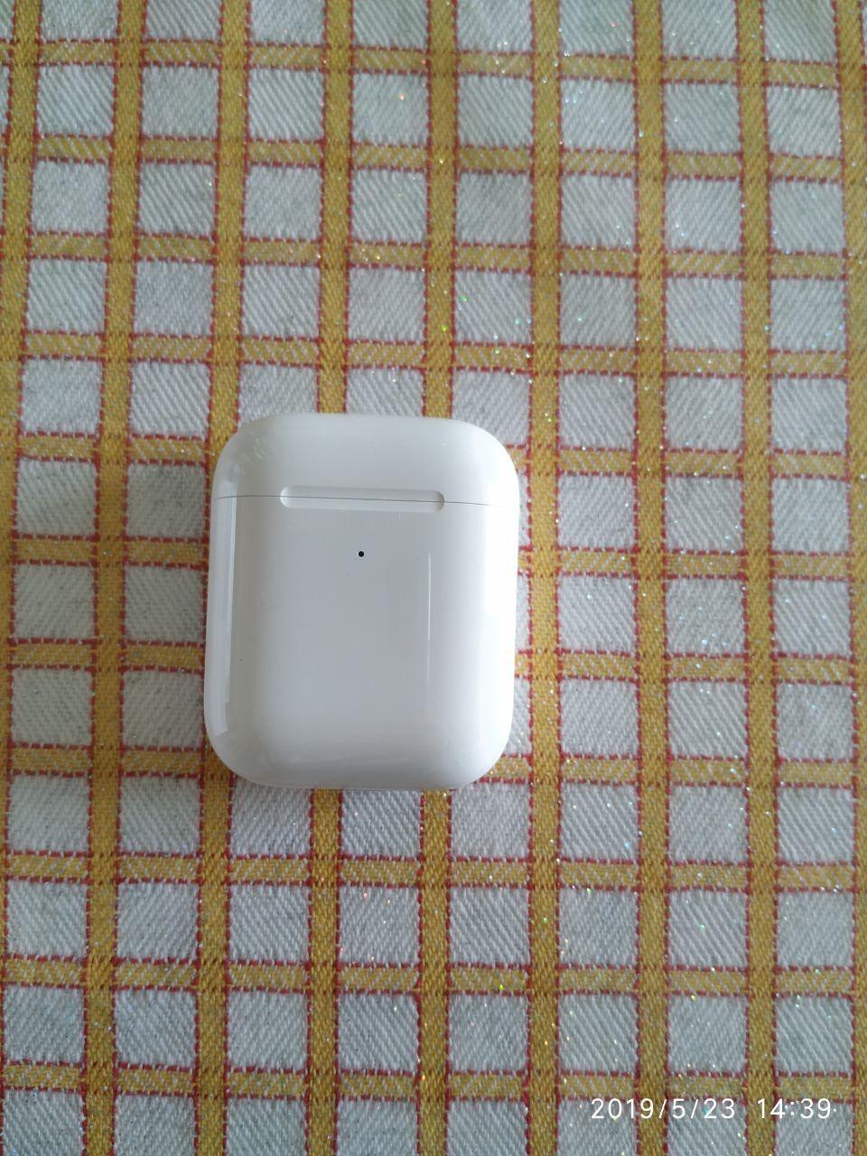 Apple AirPods auricolari wireless custodia ricarica Qi