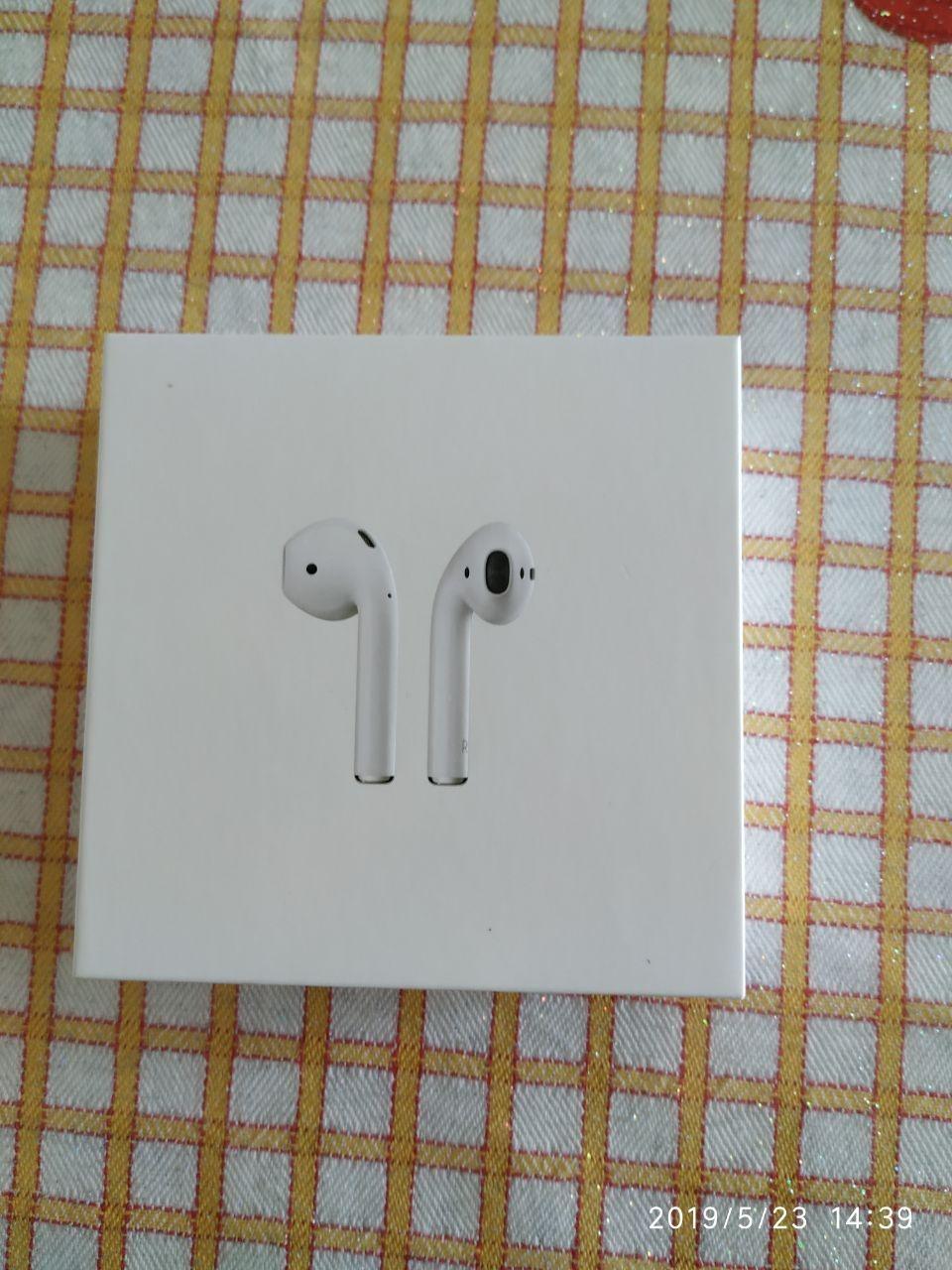Apple AirPods auricolari wireless custodia ricarica Qi