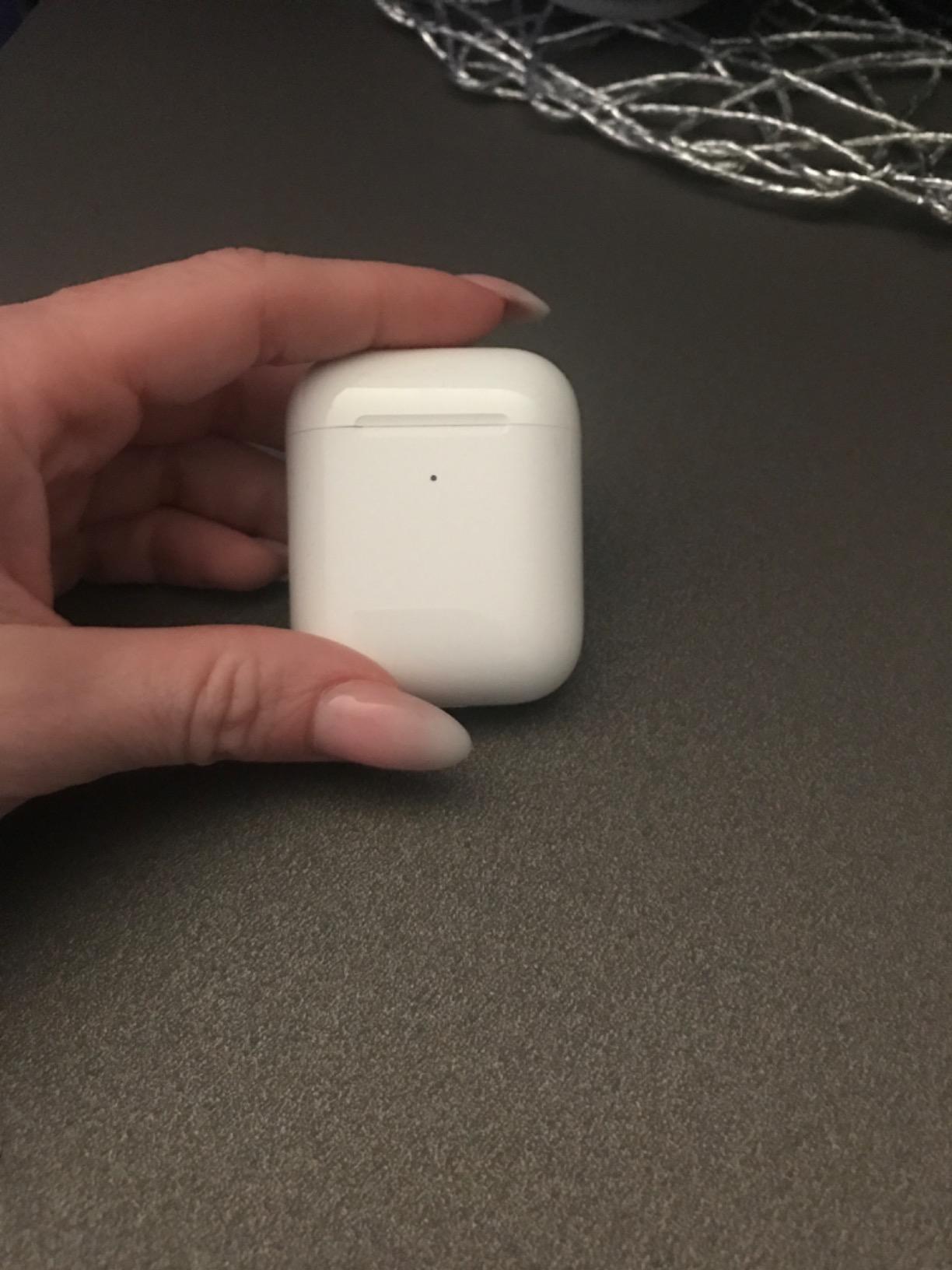 Apple AirPods auricolari wireless custodia ricarica Qi